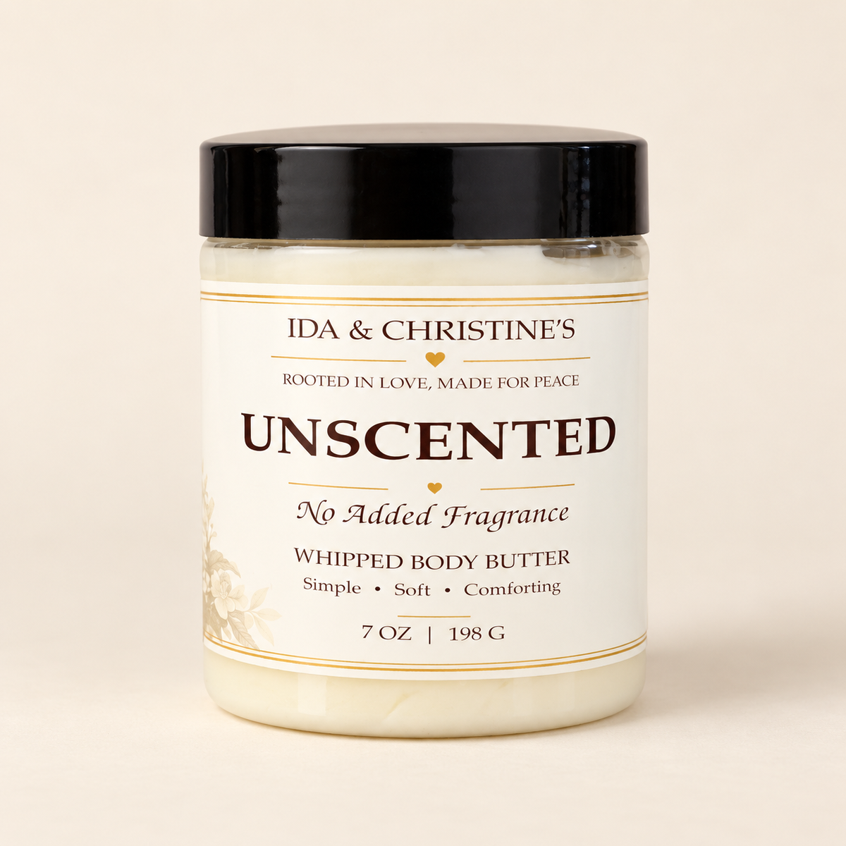 Unscented 7 oz whipped body butter by Ida & Christine’s in a black lid jar with cream label